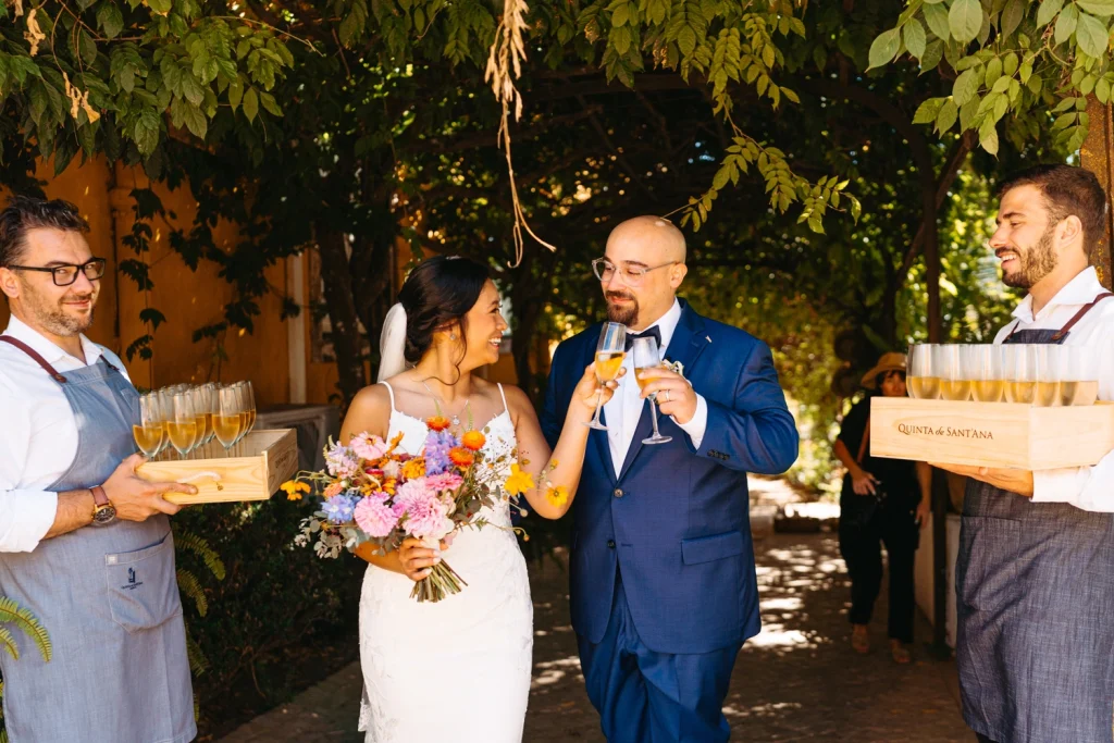 Bride and groom gazing into each other’s eyes, sharing an intimate moment on their wedding day.