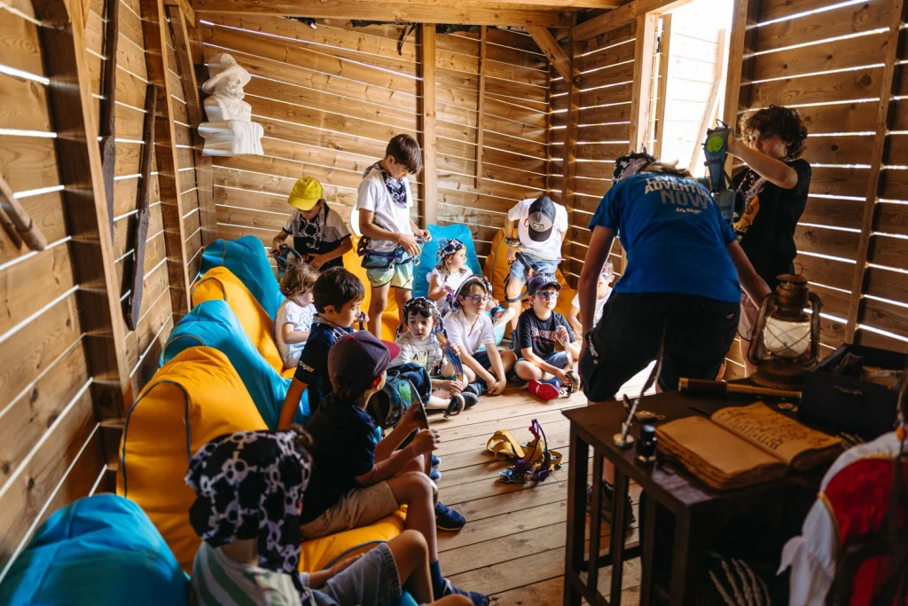 A joyful children's birthday party with face painting, themed decorations, and smiling kids in Lisbon