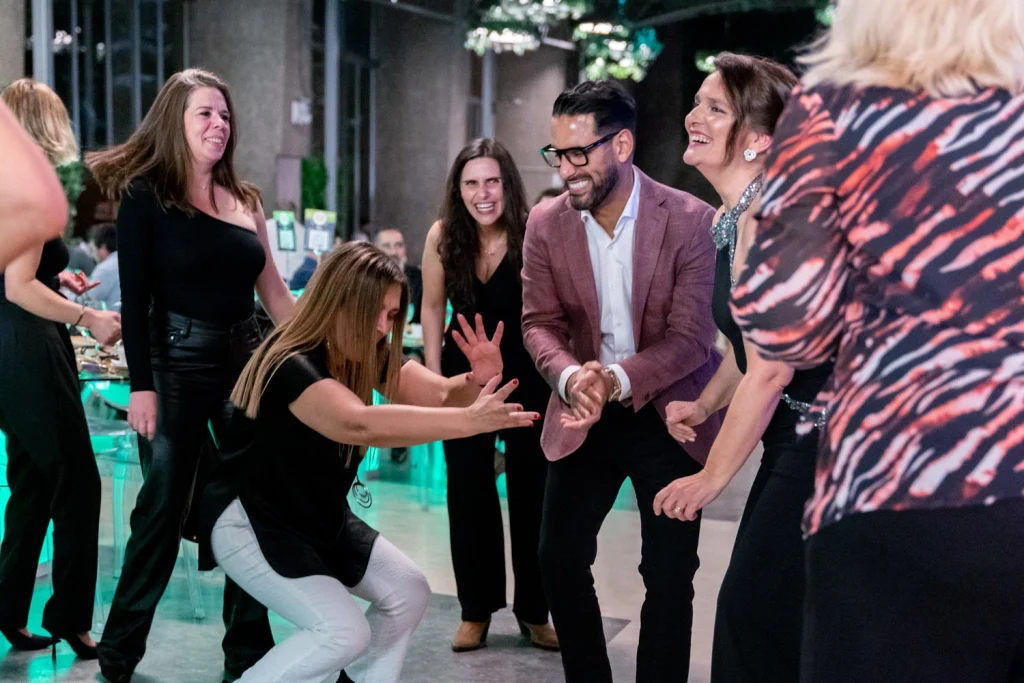 Guests let loose on the dance floor, laughing and dancing at an unforgettable event in Portugal