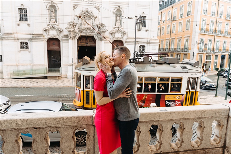 Elegant couple portrait in front of a historic church during a Lisbon photography session